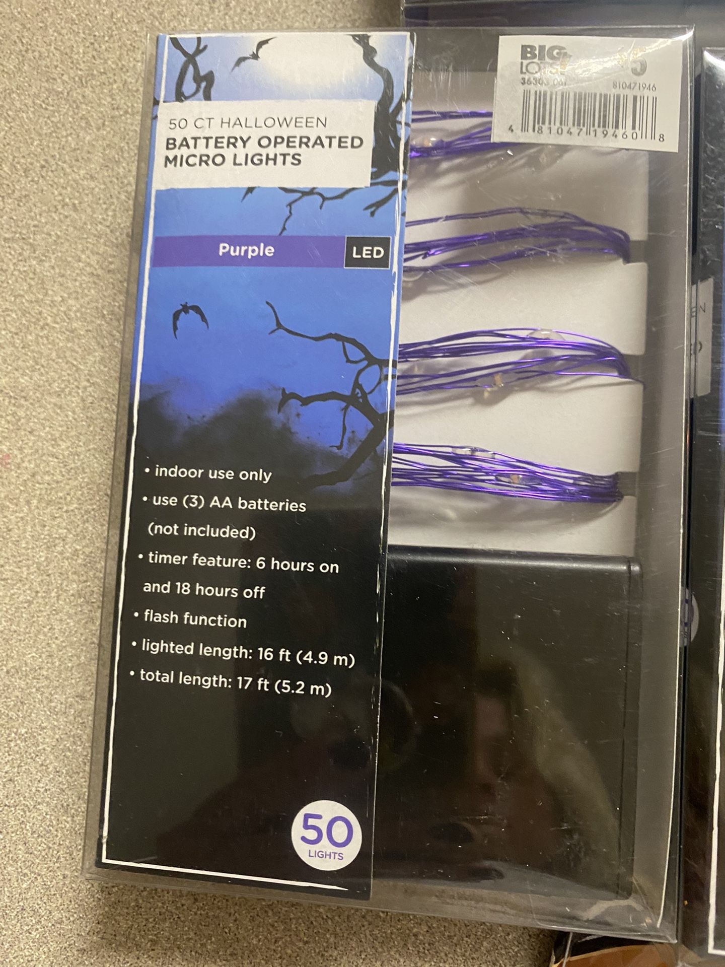 Halloween decorations fairy lights purple and orange and a 20 pack of Doris Cell AA batteries