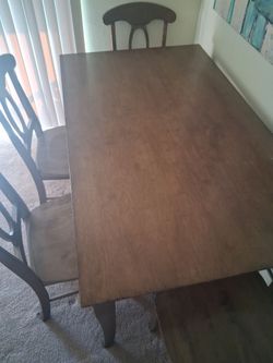 Nice wood table with 4 chairs!