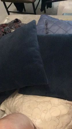 3 Dark blue throw pillows