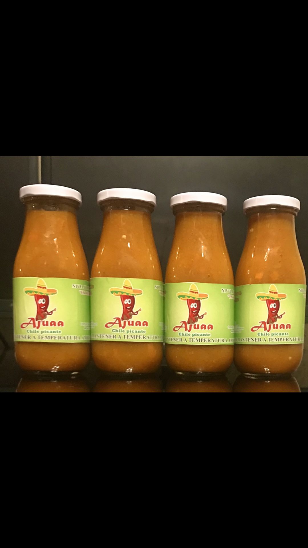 100% Fresh Homemade Honduran Habanero Chili 🌶 Hot Sauce.  “Ajuaa”  Made with 100% Fresh vegetables. 12 Oz - 1-Bottle = $6.00 12 Oz - 6-Bottles = $30.