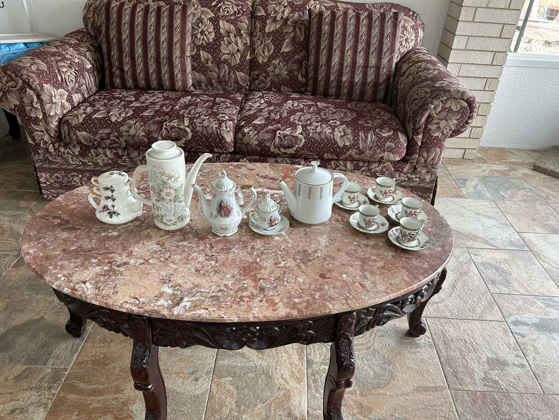 Assorted Teapots And Mini Tea Cups