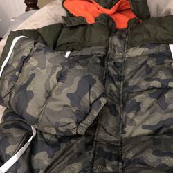 boys winter coat says large but it looks like a 10 12 