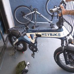 An Electric Bike For Sale And Regular Specialized Bike 