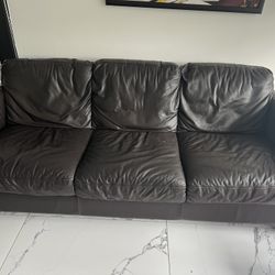 Brown Leather Natussi Couch And Loveseat 