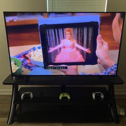 70 Inch Phillips 4K Smart Tv With Entertainment Stand