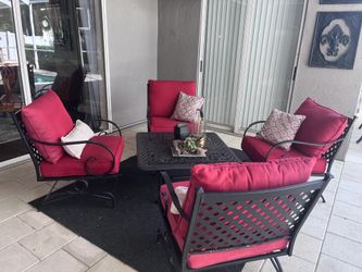 Lanai drink table and motion chairs