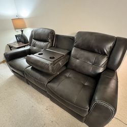 Power reclining leather sofa with drop down table (Charcoal)