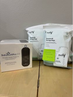 ***Brand New Baby Buddha 2.0 Breast Pump with bags