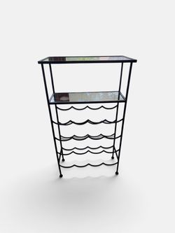 Modern black metal and glass wine rack table in excellent condition
