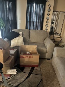 Couch and loveseat/ table