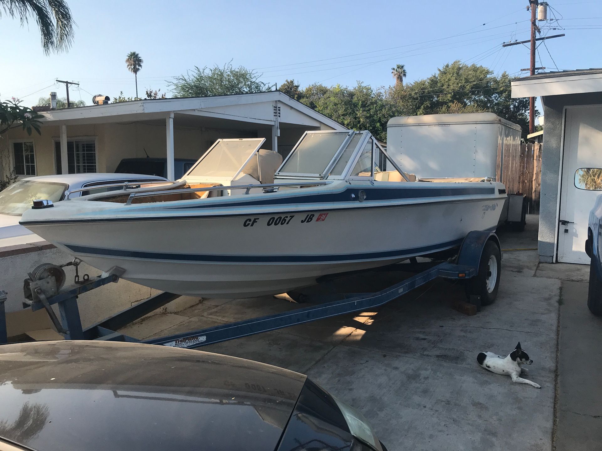 Boat and trailer. Both have the registrations for one year . Tittle in hand. 400