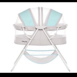 Dream On Me Karley Bassinet In Blue/Grey  Open box item   INVENTORY NUMBER: 10(contact info removed)4