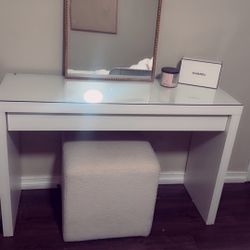 Desk with glass mirror, and small bench