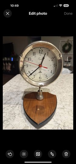 Equity Quartz Naval Clock Made In Hong Kong.  Works great.