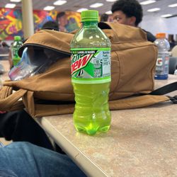 Mtn Dew Half drank with backpack 