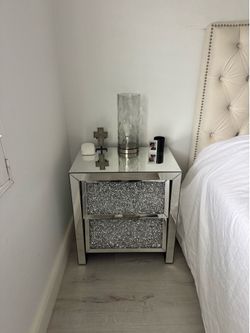 Two glass bedroom dressers