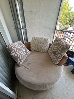 Tan Swivel Chair