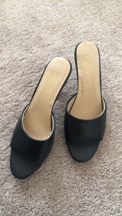 Black under red heel shoe