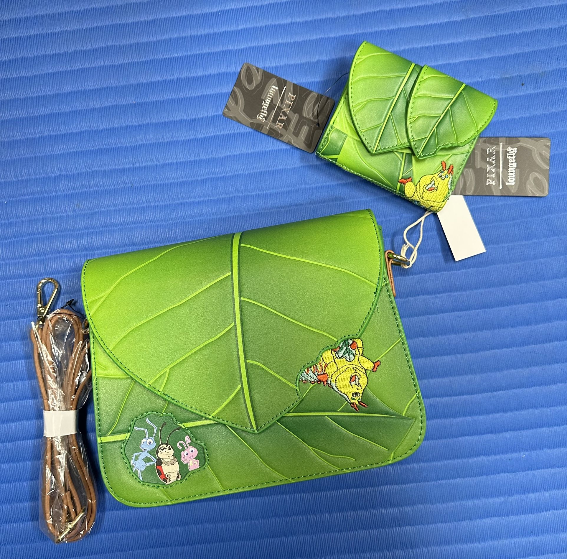 Loungefly Disney Pixar Bugs Life Crossbody Purse and Matching Wallet - Both  NWTs Loungefly Disney Pixar A Bug's Life Leaf Crossbody Purse: Approx. 9  for Sale in Glendale, AZ - OfferUp
