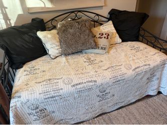 Twin metal daybed with trundle and mattresses