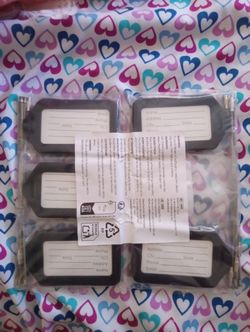 New, unopened luggage tags