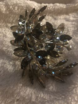 Beautiful bouquet of grey and clear rhinestone brooch