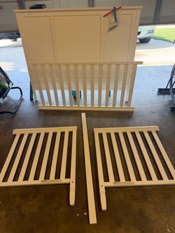 White Wood Baby Crib Disassembled