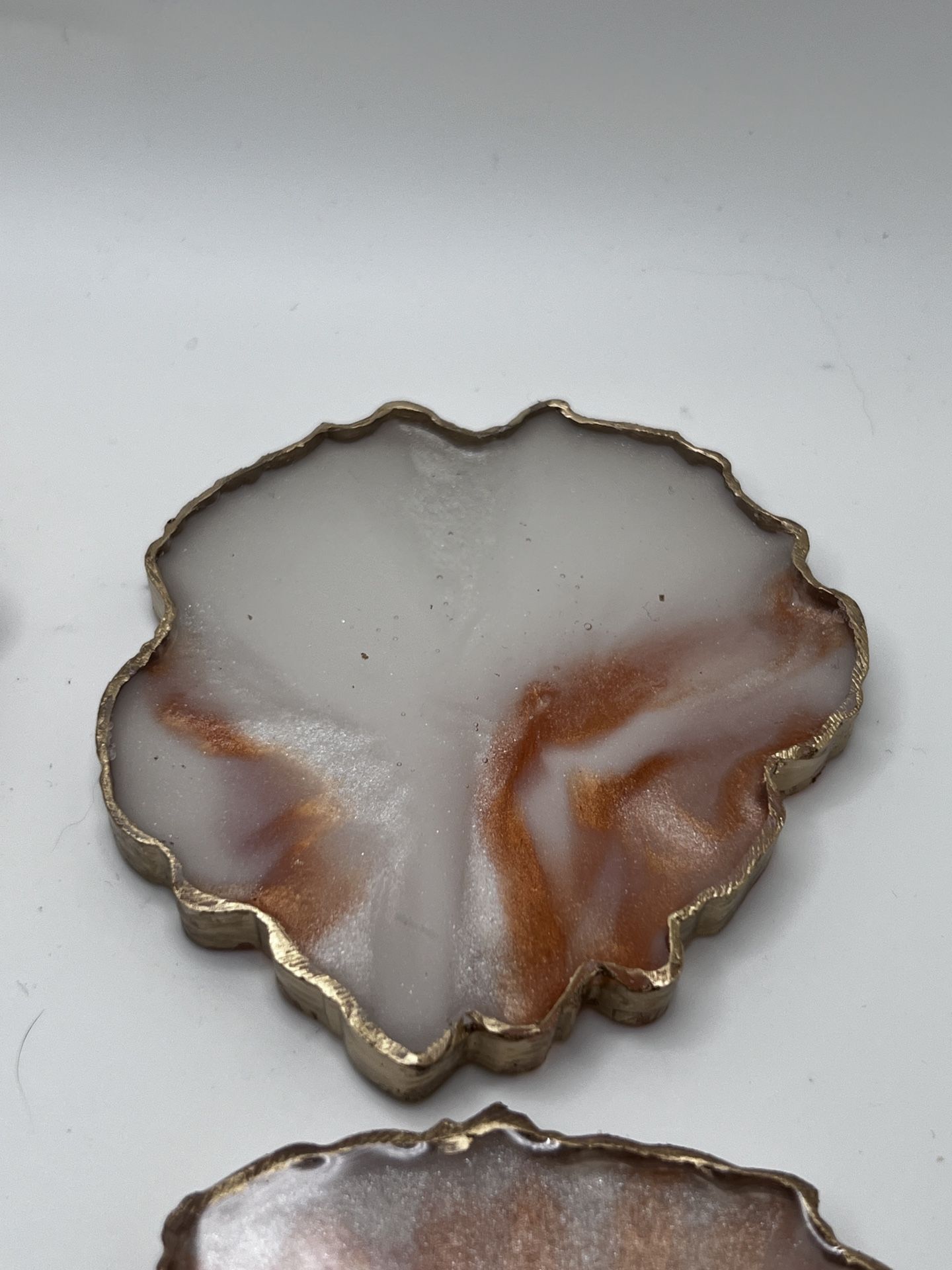 Set Of Four Copper And White Handmade Resin Coasters