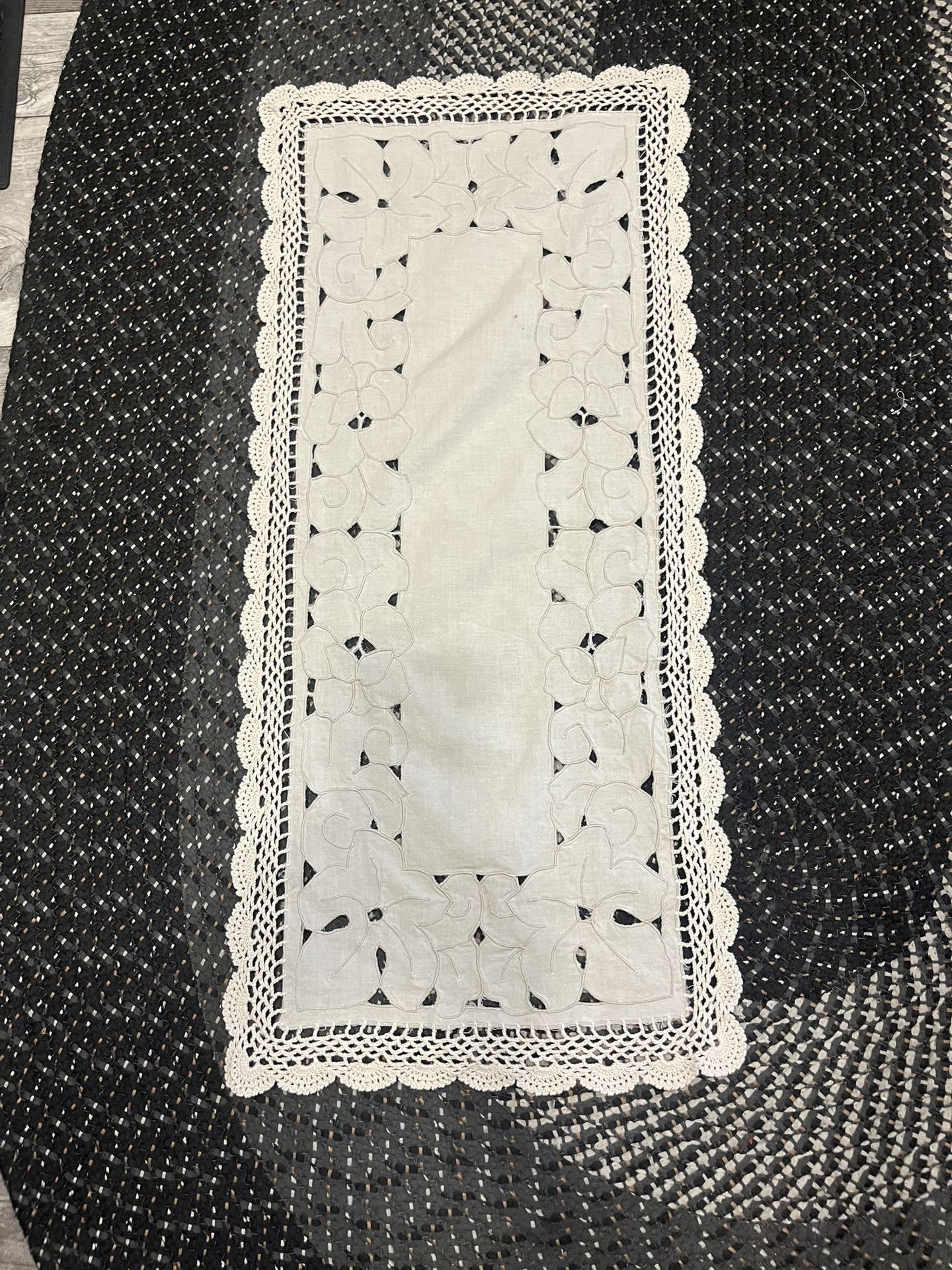 Table dresser, antique runner with crochet on the edge. Do I leave looking?