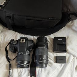 Canon EOS Rebel T7 body with 2 Zoom lenses