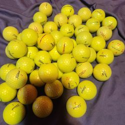 51 Used Titleist  Mix Yellow Golf Balls 