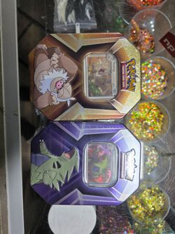 Pokemon cards tins whammy
