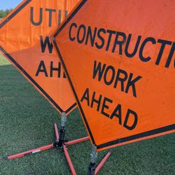 Two Construction Site Signs
