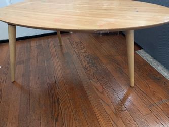 Oval wooden coffee table.