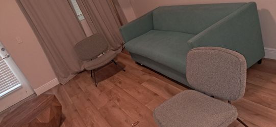 blue sofa bed and 2 chairs