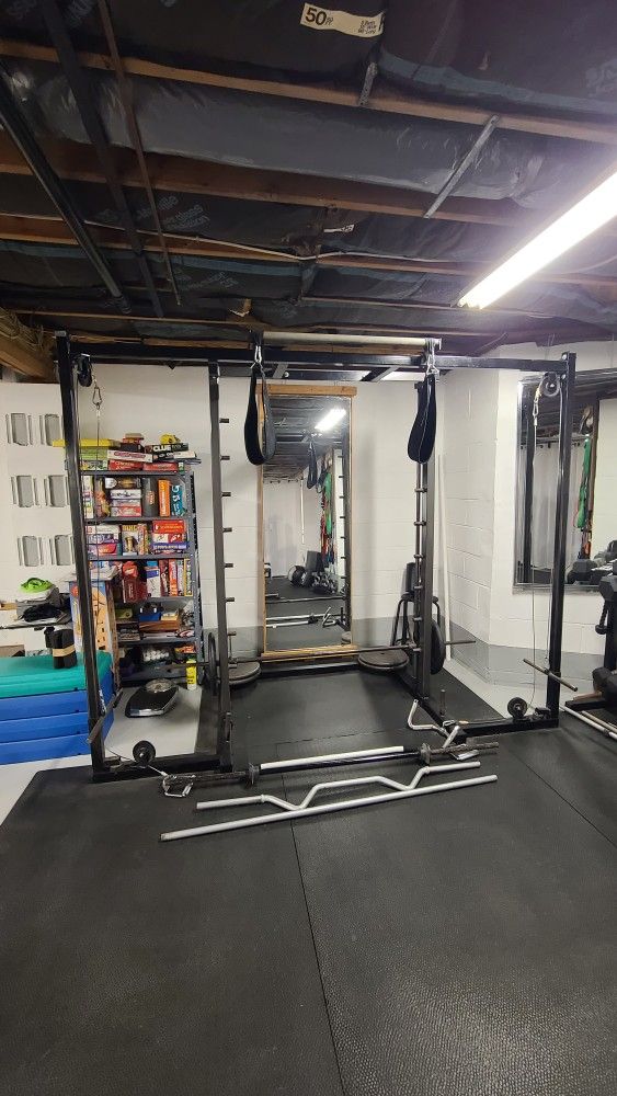 smith machine cable crossover with tons of weights