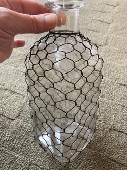Glass Bottle decor With Metal Wire Detailing Approximately 9 Inches Tall 