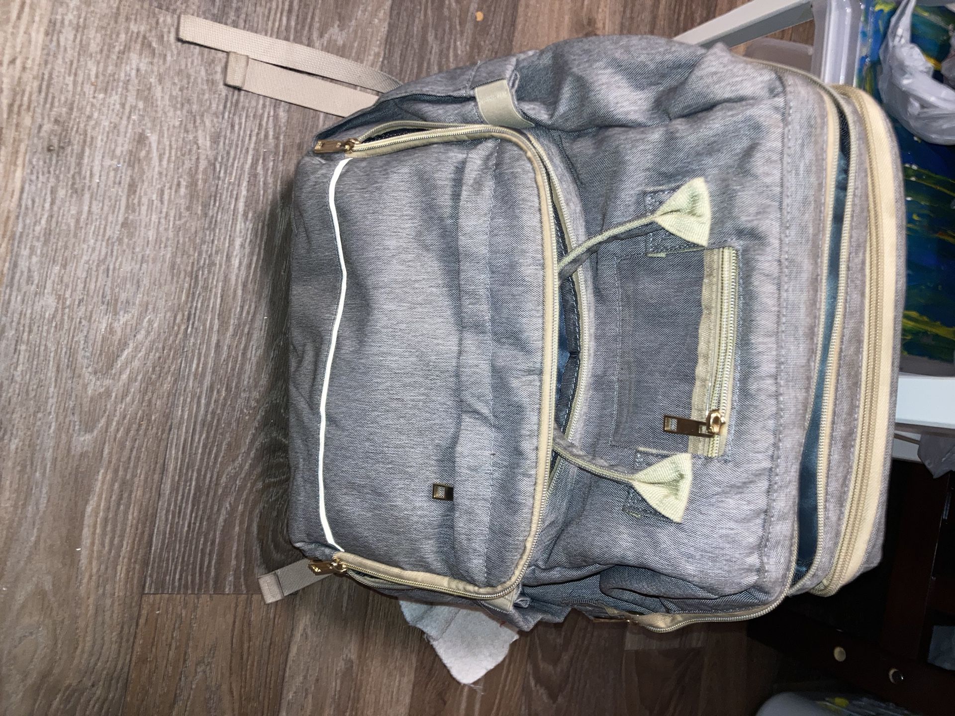 Diaper Bag Turns To Infant Travel Bed