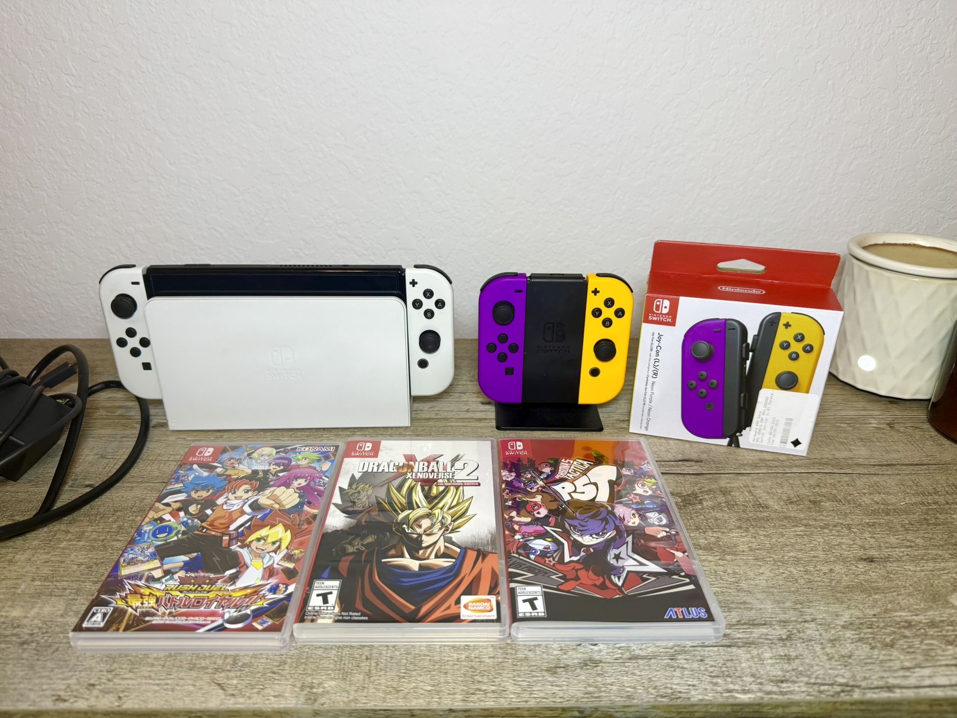Nintendo Switch OLED White + Extra Joy-Cons (Purple/Orange) + 3 Games
