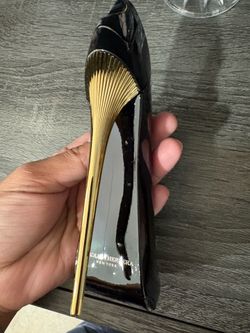 Carolina Herrera Good Girl perfume (blue heel).