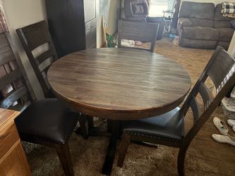 Huron Pedestal Table 42” x 42” without the leaf inserted