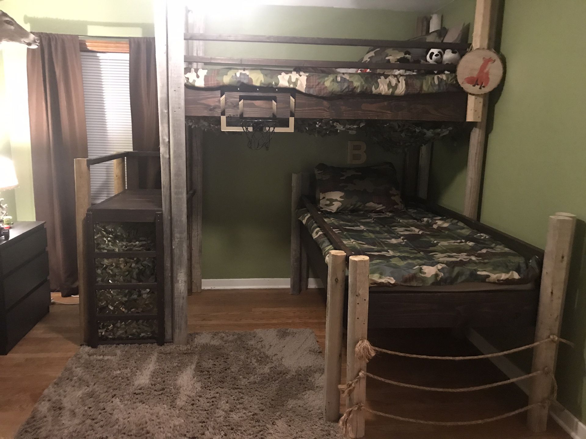 Woodsy/outdoor theme Custom wooden bunk beds