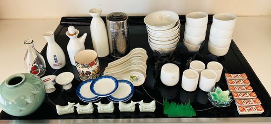 Asian bowls &cups, soup bowls,jade chop sticks & others,saki cups & pourers, serving plate, chop stick holders, and more, see photos.