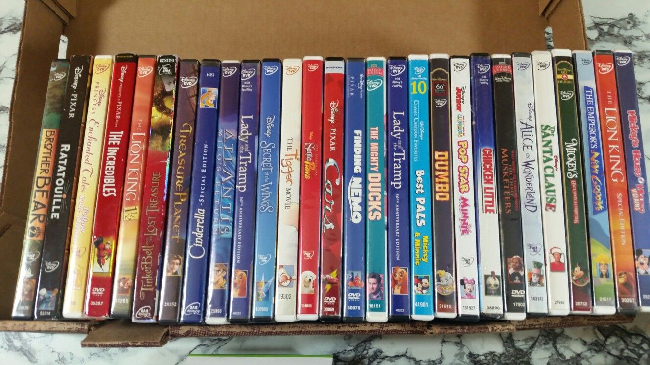 28 Disney dvd movies lion King cars Nemo lady tramp mickey and more dvd lot