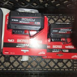Two Of The Milwaukee, High Output Heavy Duty Batteries.  They Are Both  M18 - Xc8.0aH Batteries... Over $270 Retail For Just One Of Them @ Home Depot.