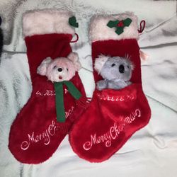 Red Plush Christmas Stockings With A Stuffed Toy