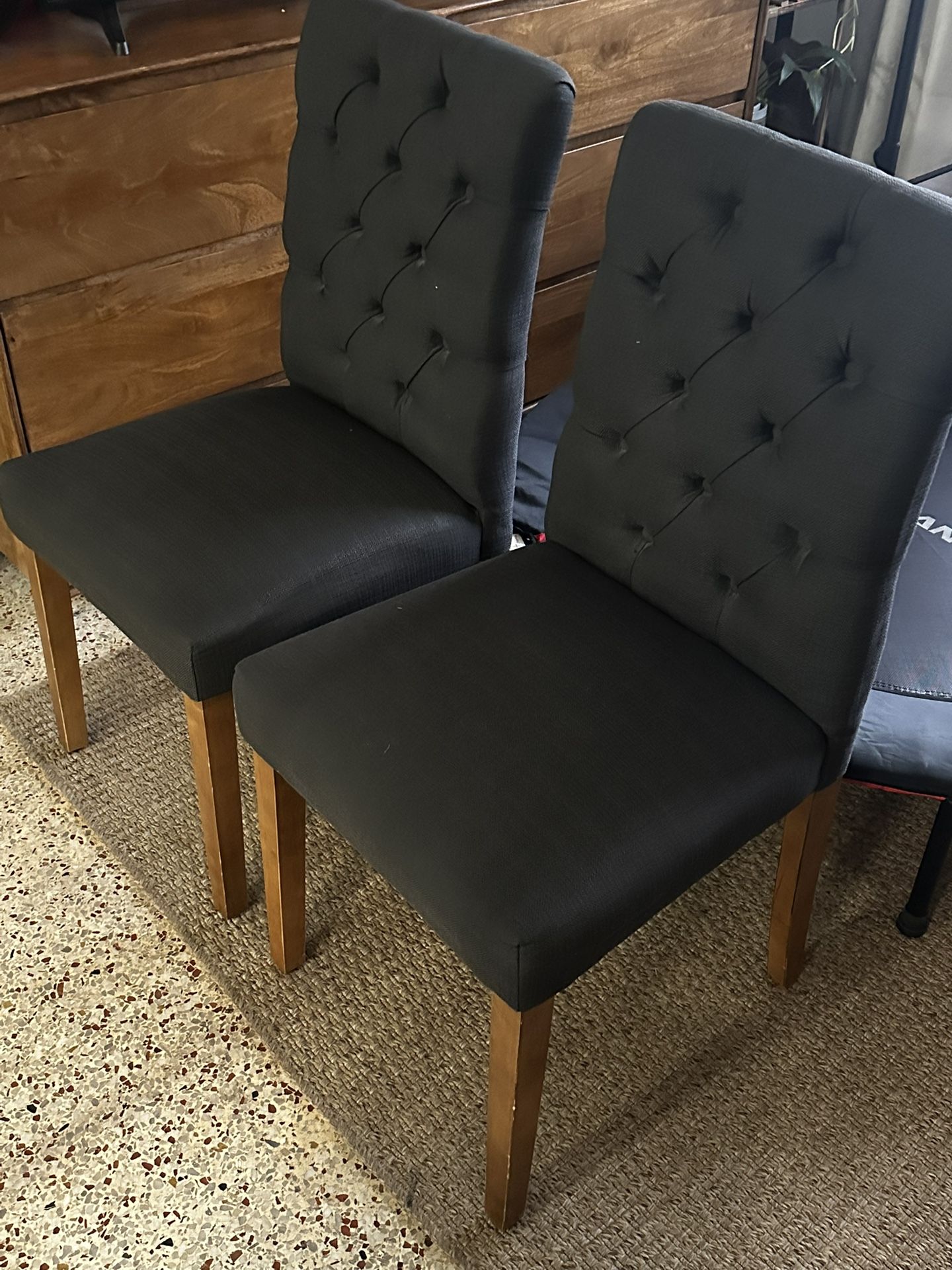 Black Cushioned Chairs With Wooden Legs