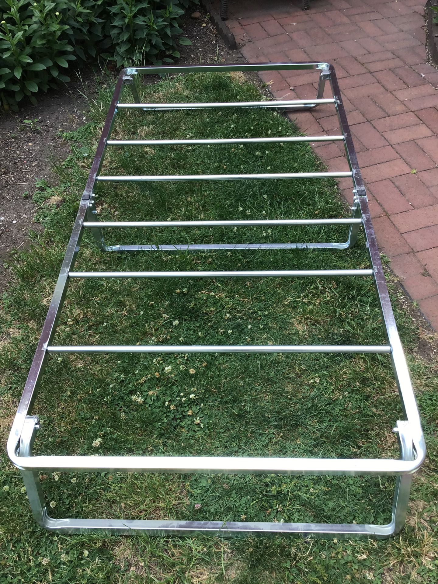 Bed folding frame light weight Portable  about 36”wide 70” long good to use with your air mattress 
