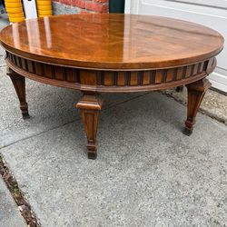 Round walnut coffee table