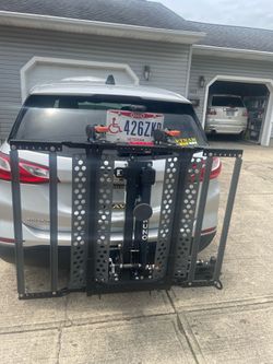 Car scooter mobility lift with swing out